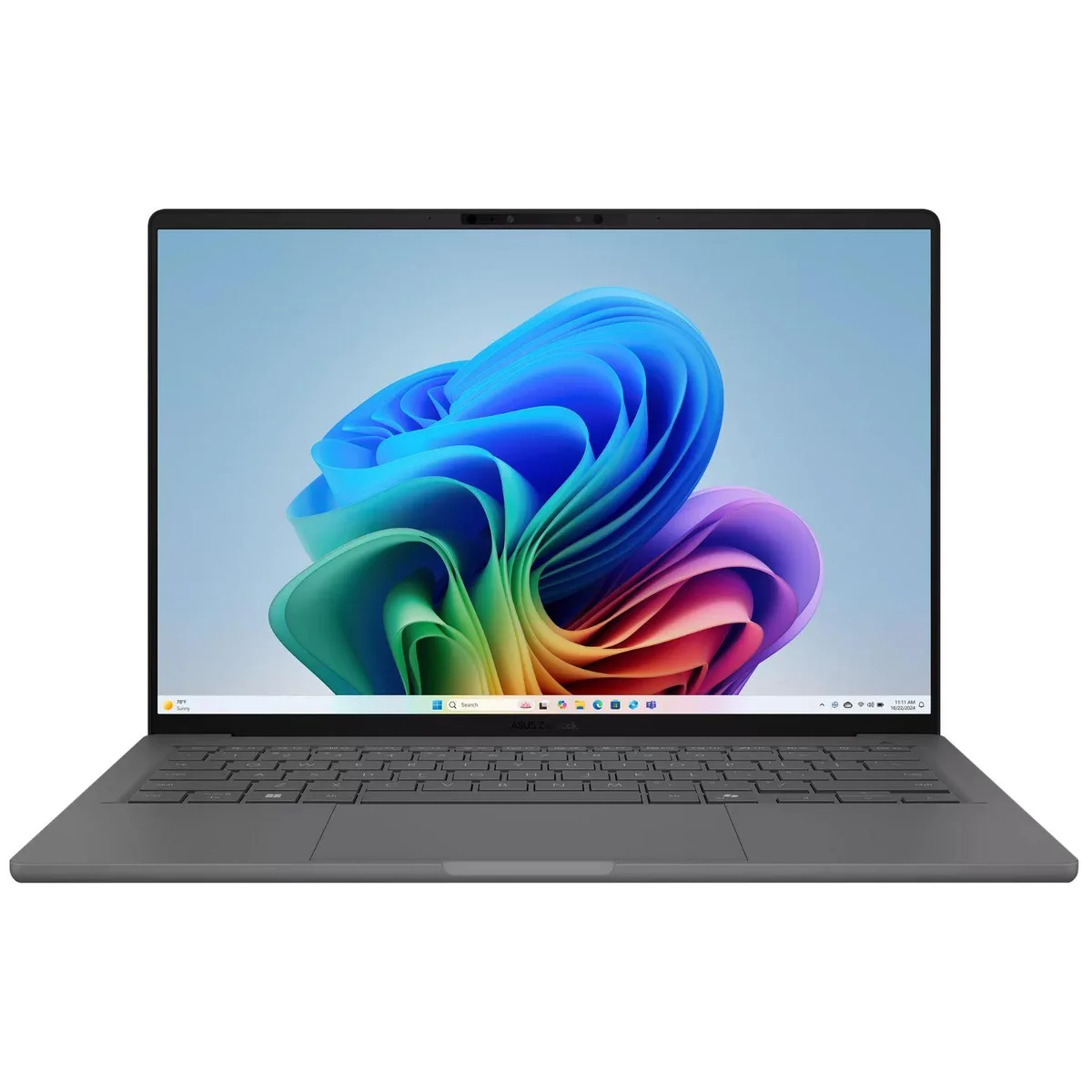 Grey 14 inch laptop, matte finish, minor scratches and dents visible