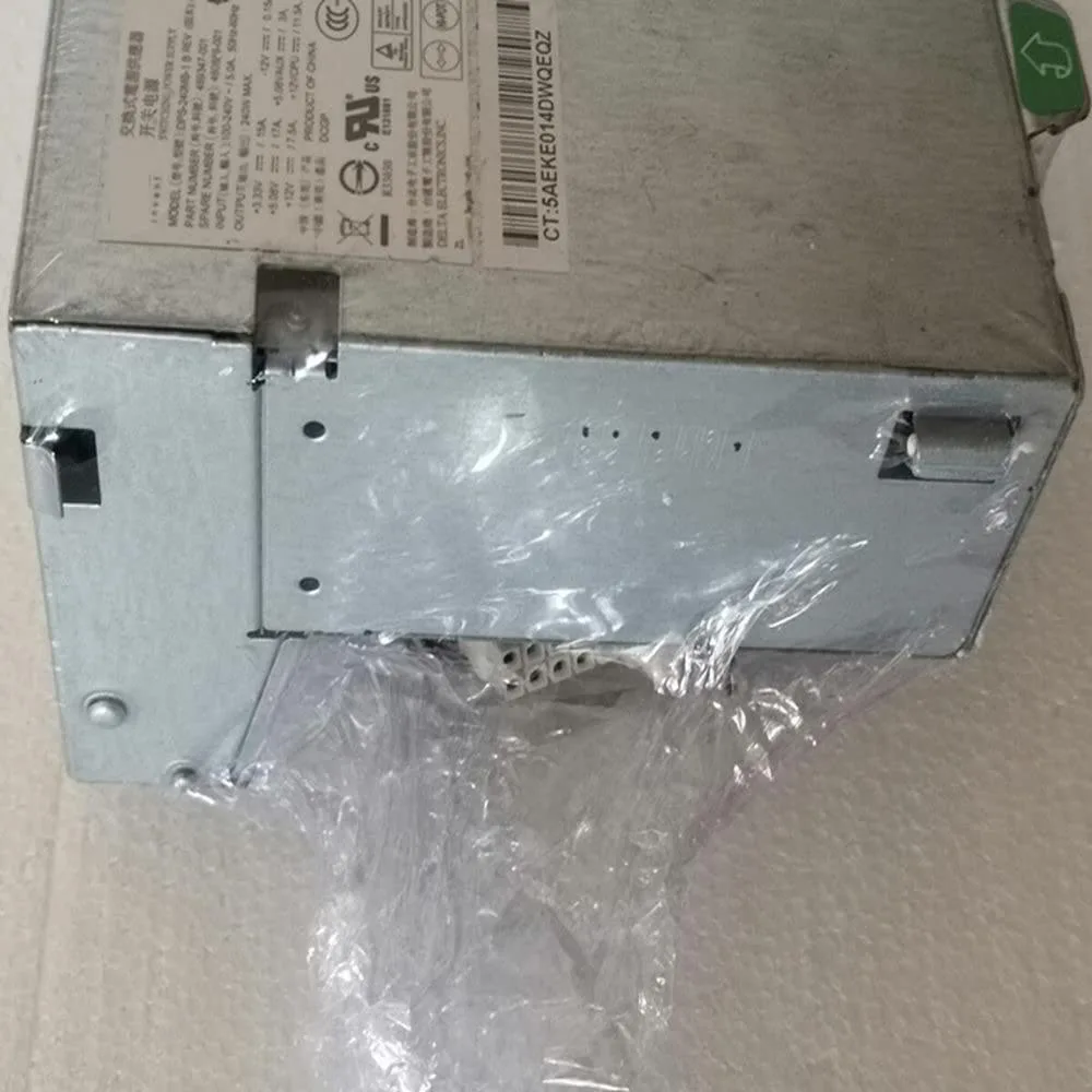 Rectangular metal power supply unit with ventilation grille and label listing model numbers