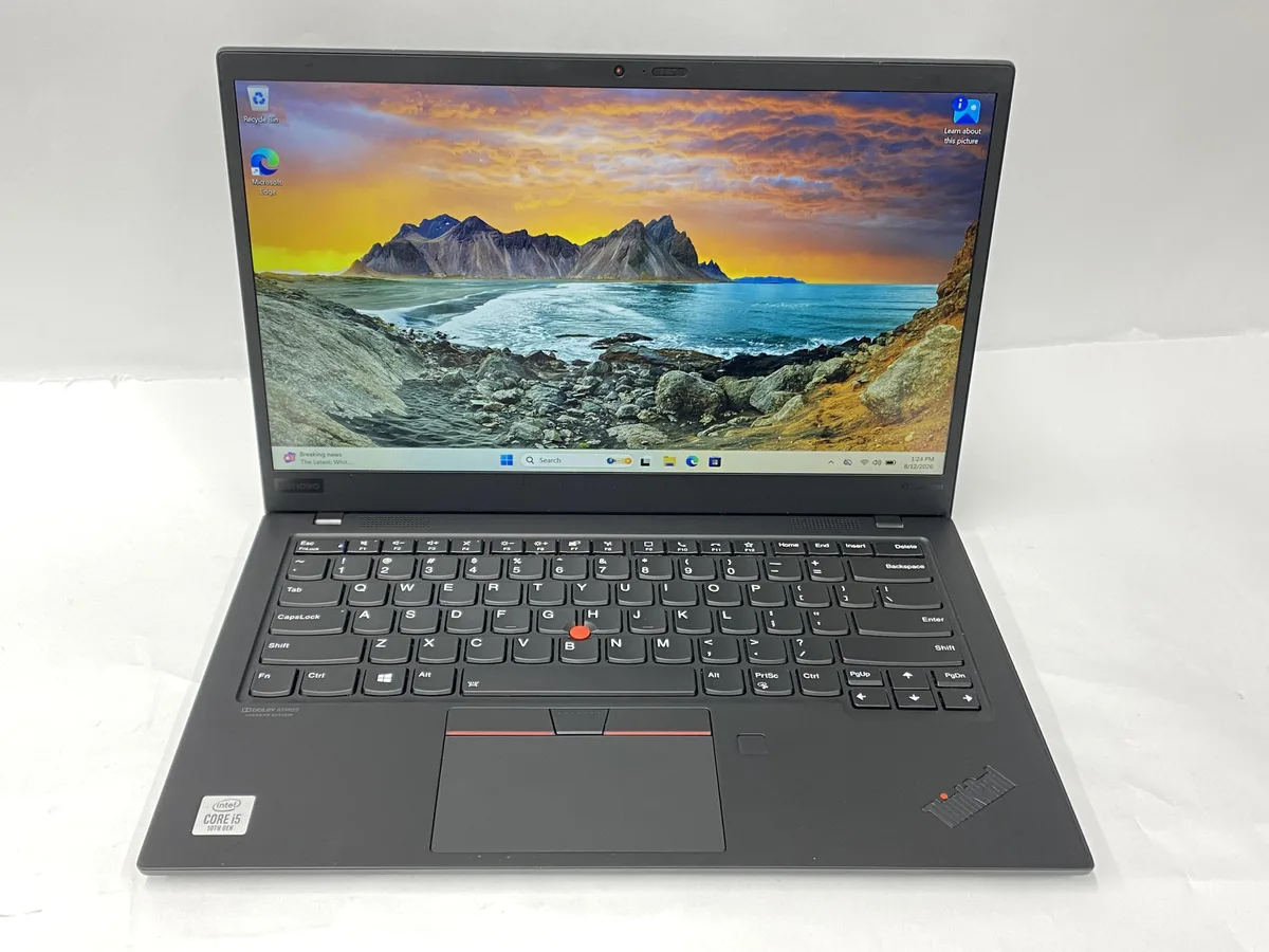 Slim silver laptop closed on a plain background
