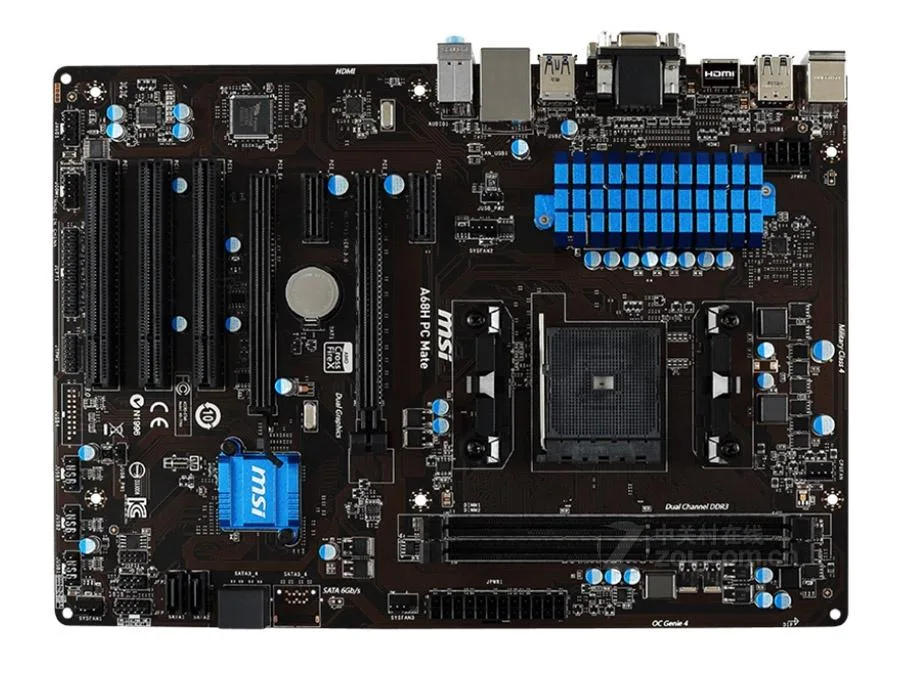 Green ATX motherboard with black sockets and silver heatsinks