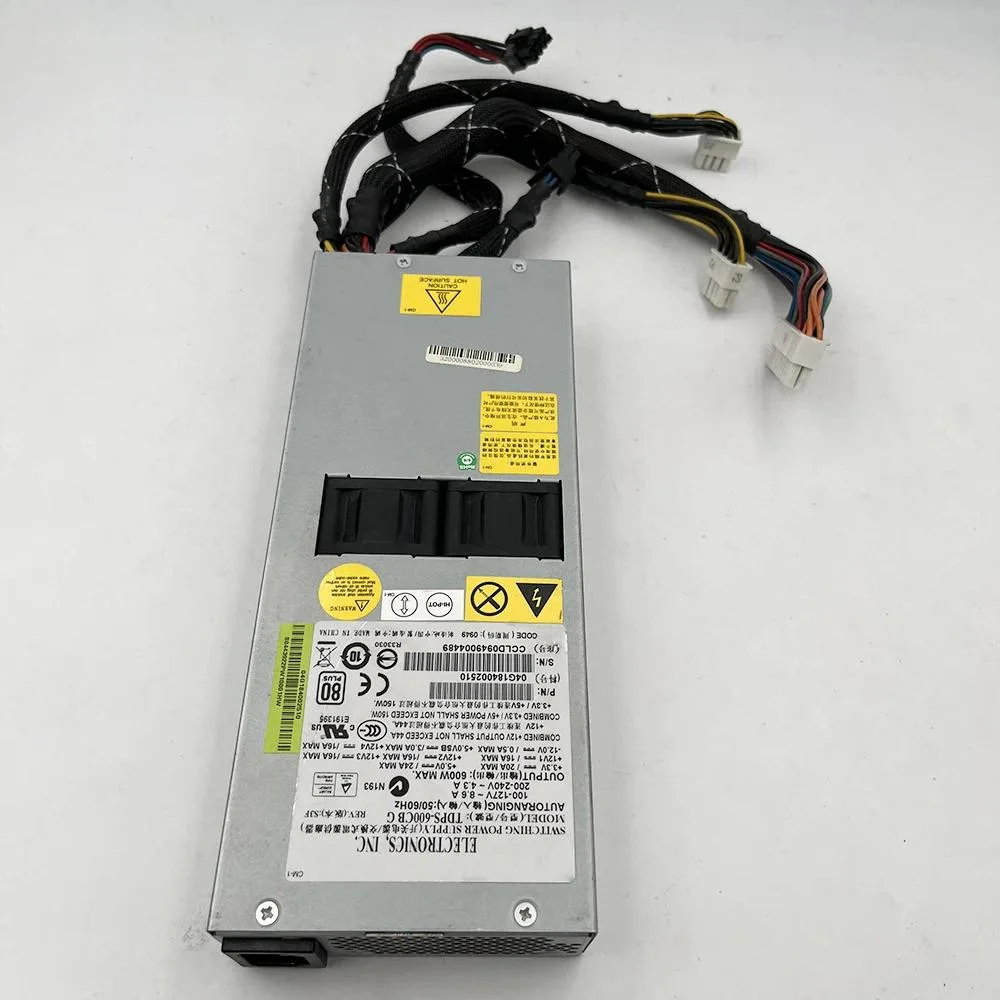 Rectangular silver ATX power supply unit with ventilation grille