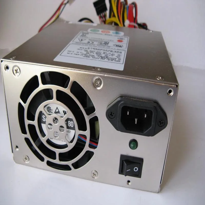 Rectangular silver ATX power supply unit with rear fan grille and side label