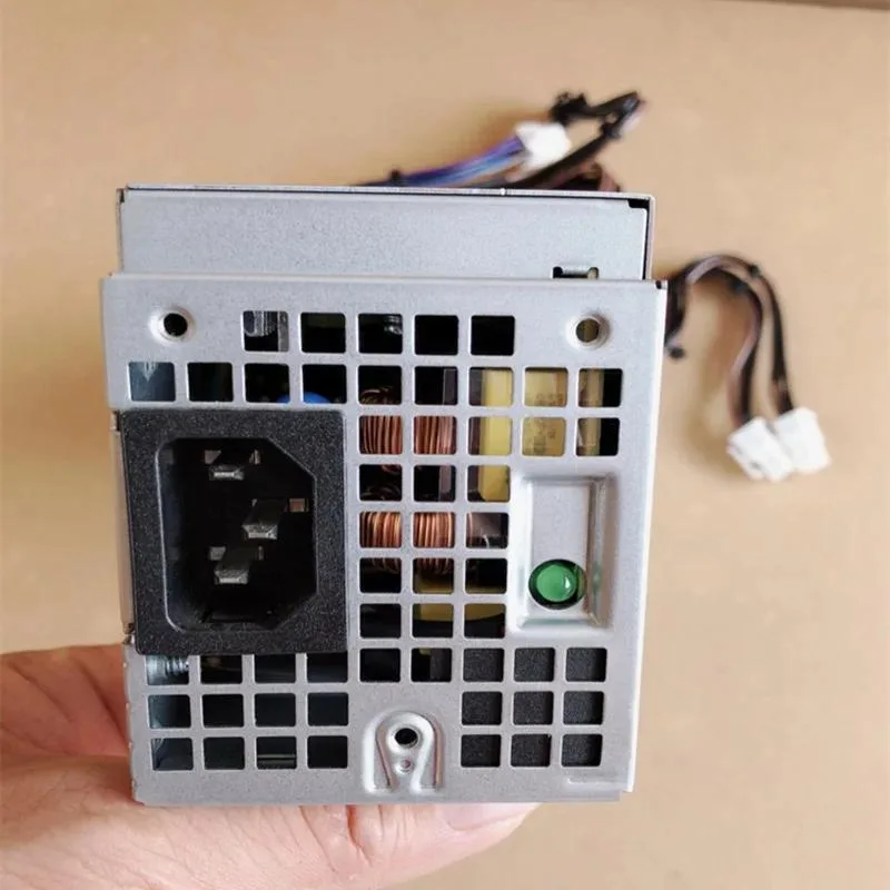 Black rectangular ATX power supply unit with visible fan grille and modular cable sockets
