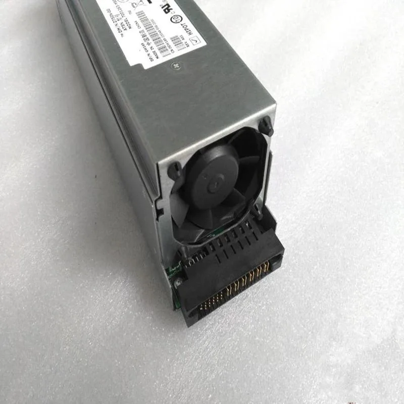 Rectangular ATX power supply unit with matte black metal casing and cooling fan grille