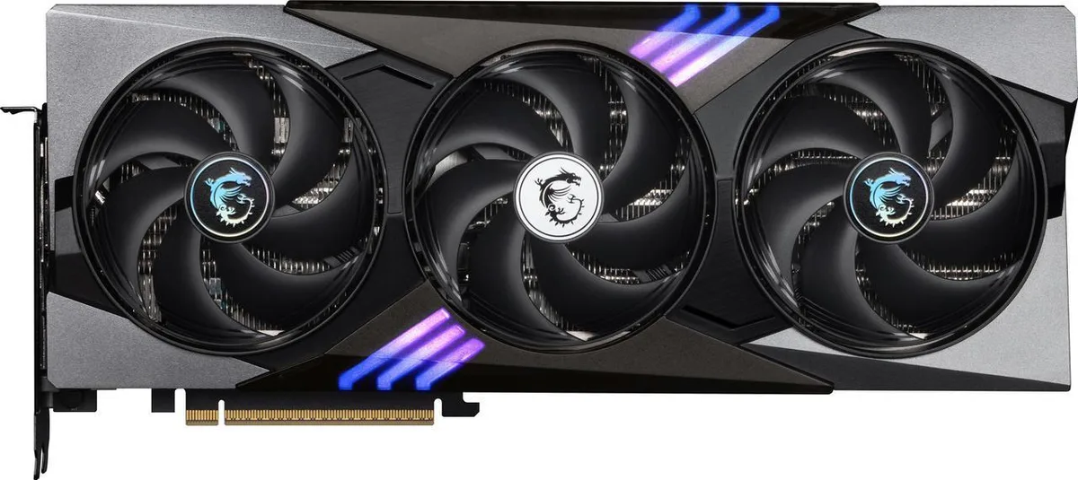 Triple-fan graphics card with silver and black shroud, exposed heat pipes and illuminated MSI logo