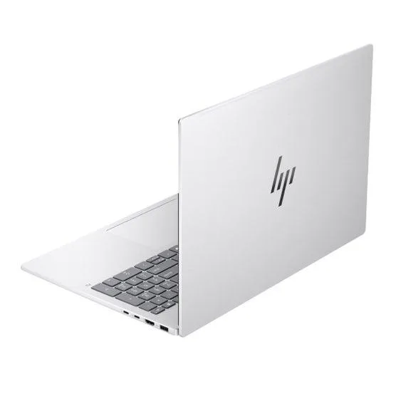 Silver 16 inch OLED touchscreen laptop, thin bezels, backlit keyboard with numeric keypad