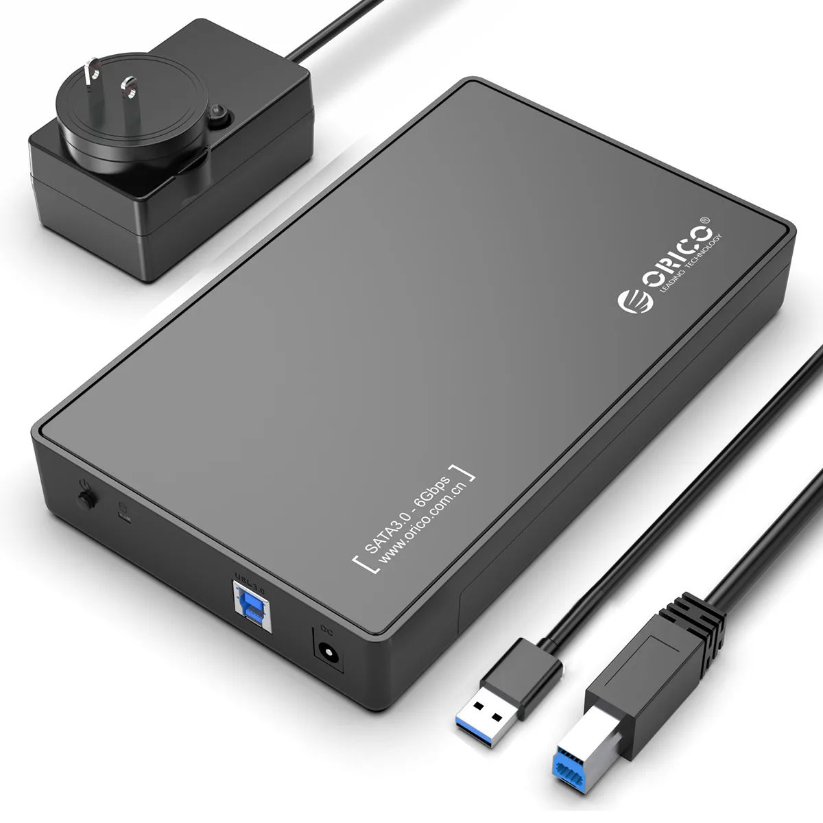 Black 3.5-inch SATA drive enclosure with USB 3.0 cable and power adapter