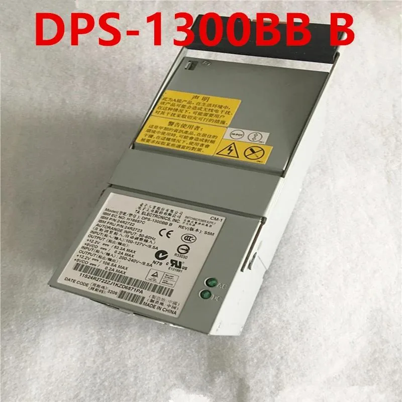 Rectangular metal ATX power supply unit with ventilation grille and label showing model DPS-1300BB B