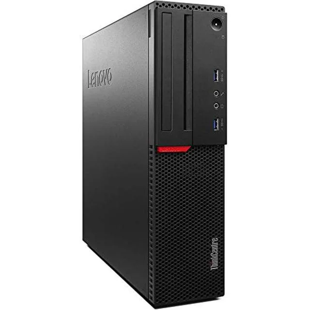 Small black desktop tower with wireless keyboard and mouse