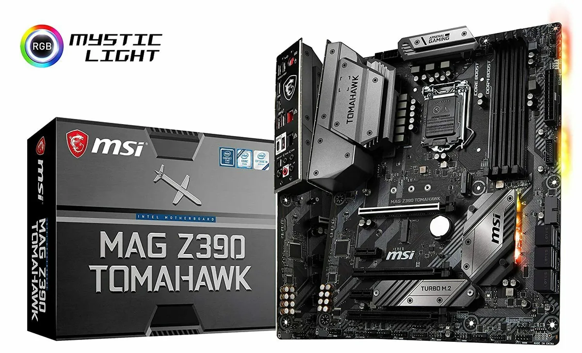 ATX motherboard, black PCB, silver heatsinks, pre-installed I/O shield