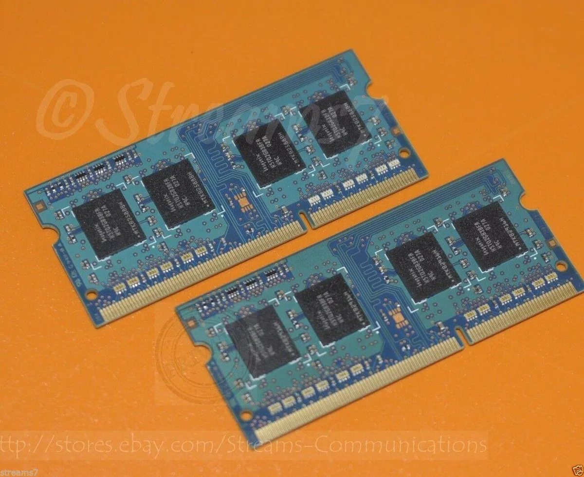Two green SO-DIMM sticks with gold contacts and black chips
