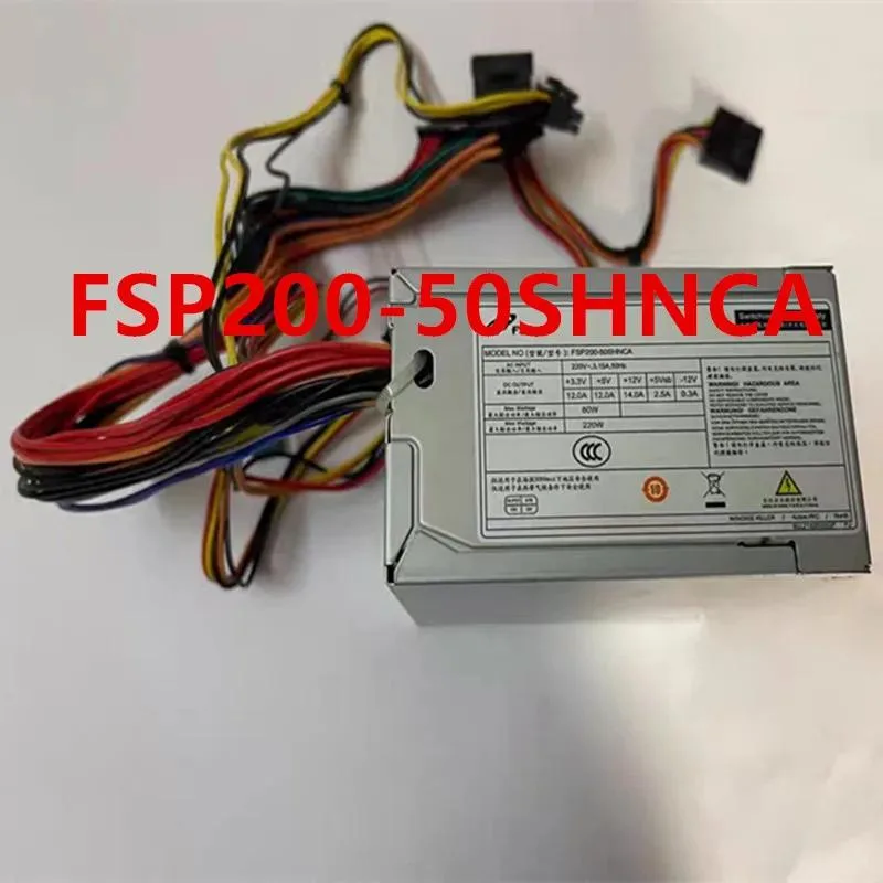 Compact silver ATX power supply unit with fan grille and modular cable connectors