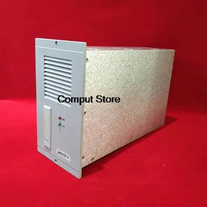 Rectangular silver metal power supply module with ventilation slots and connector pins