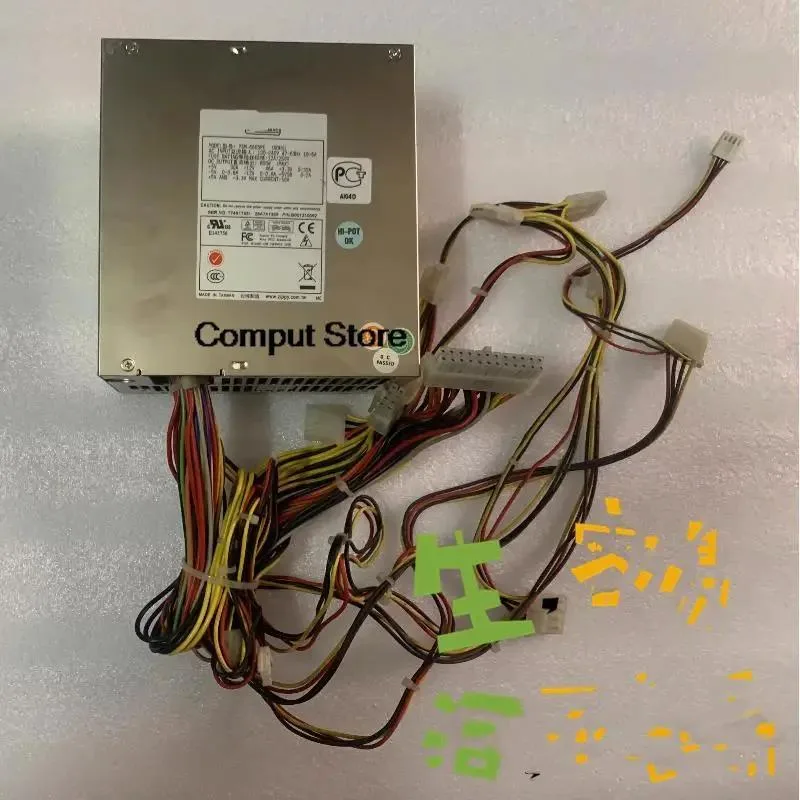 Silver rectangular ATX power supply unit with ventilation grille and power connector visible