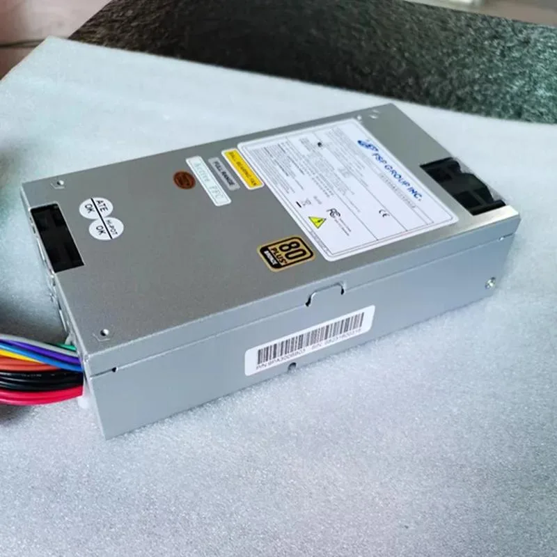 Silver 1U 300W ATX power supply unit with rear fan grille and cable connections