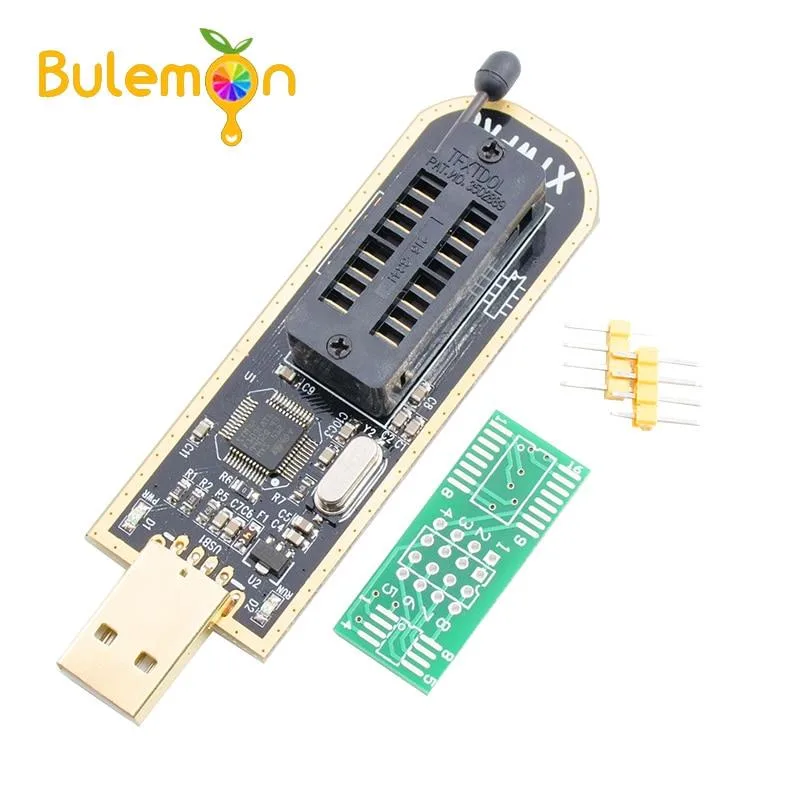 Two small rectangular USB programmers with pins and connectors on a light surface