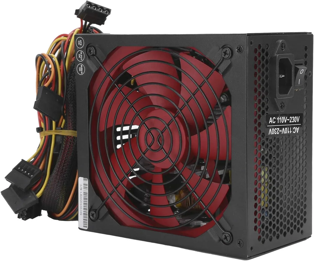 Rectangular black ATX power supply with red 14cm fan visible through side grille