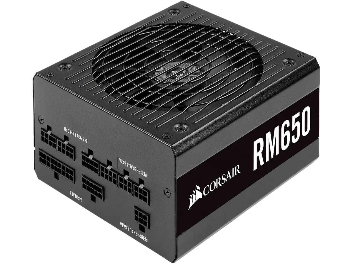 Black rectangular ATX power supply unit with modular cable sockets and a single 140mm fan grille