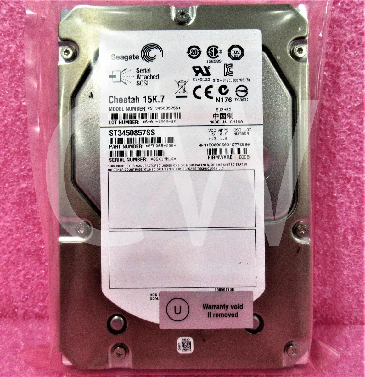 Silver 3.5 inch SAS hard drive bare unit with circuit board visible