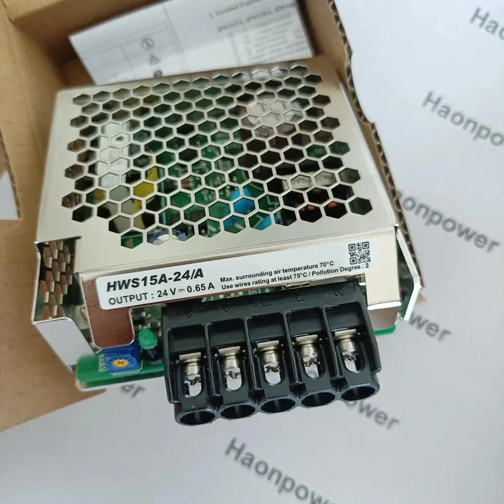 Compact rectangular power supply unit with metal casing and terminal connections