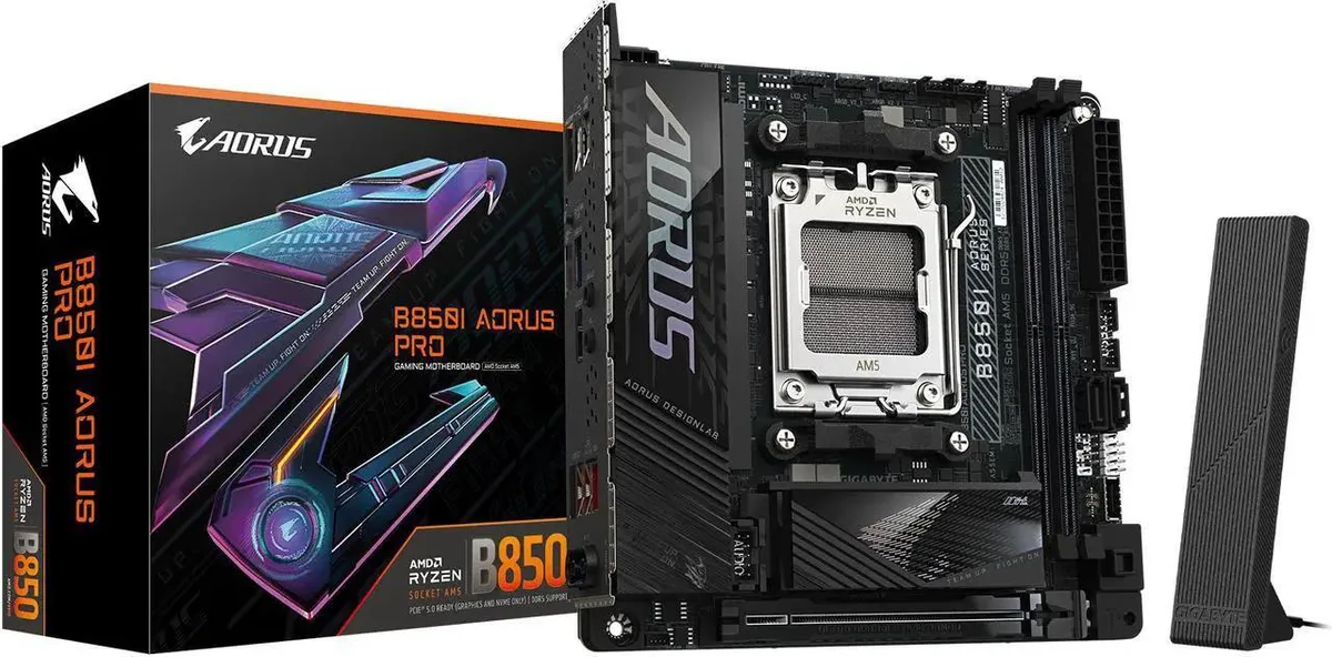 Mini-ITX motherboard with black PCB and silver heatsinks