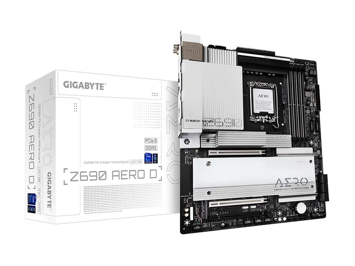 Silver extended ATX board, black heatsinks, white PCB accents, four DDR5 slots, dual PCIe 5.0 x16, rear I/O shield