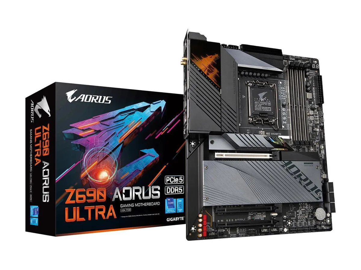 ATX motherboard, dark grey PCB with silver heatsinks and RGB accents