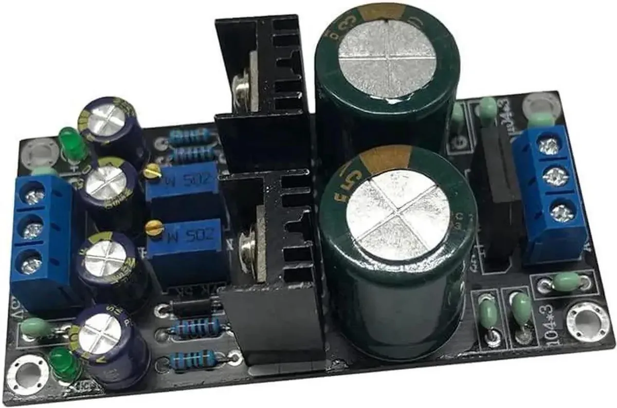 Ten green rectangular circuit boards with adjustable voltage regulators and solder points