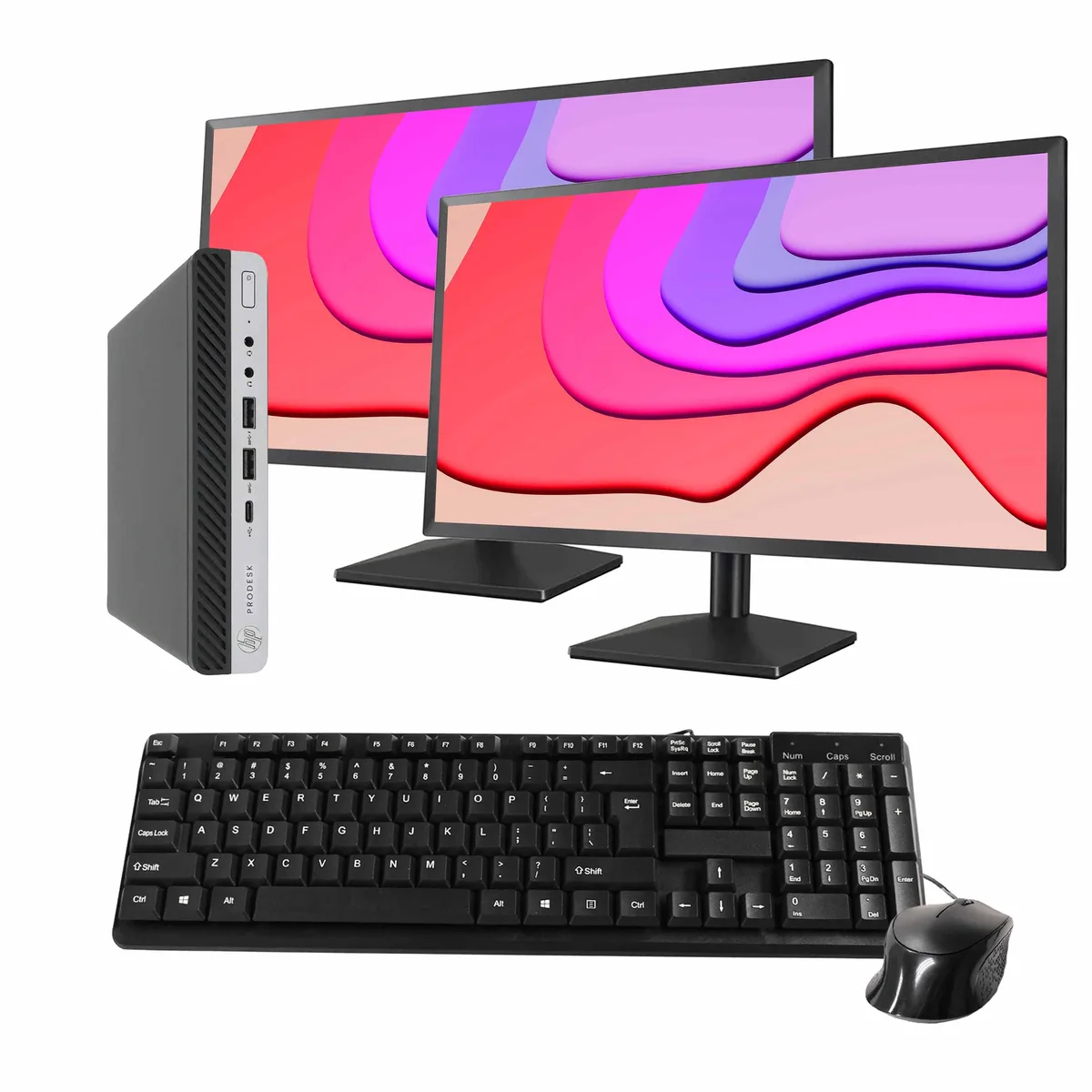 Black and silver mini desktop with two 24-inch monitors, wired keyboard and mouse