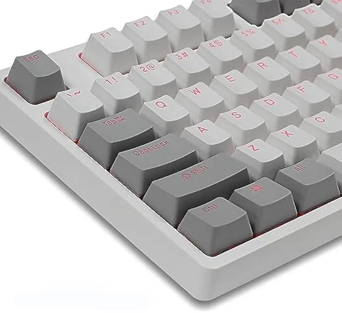 A set of 109 grey and white PBT keycaps with translucent legends, OEM profile, 1.4 mm thick, plus a key puller