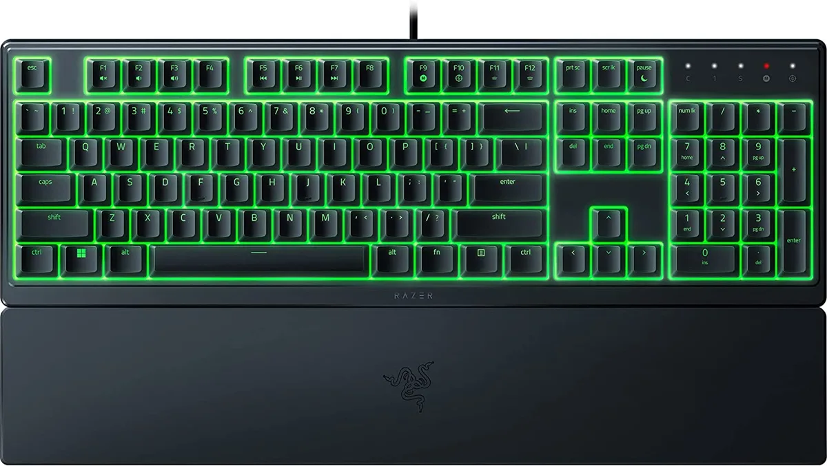 Low-profile black gaming keyboard with detachable wrist rest and RGB backlighting