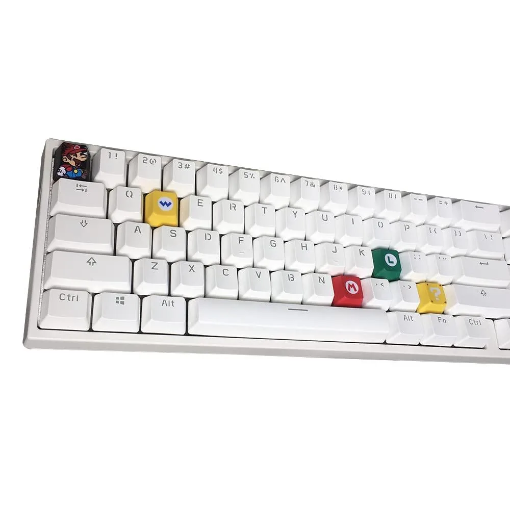 Five black PBT keycaps with Mario dye-sub legends, OEM profile