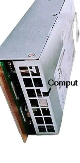 Rectangular metal ATX power supply unit with ventilation grille and label showing model numbers