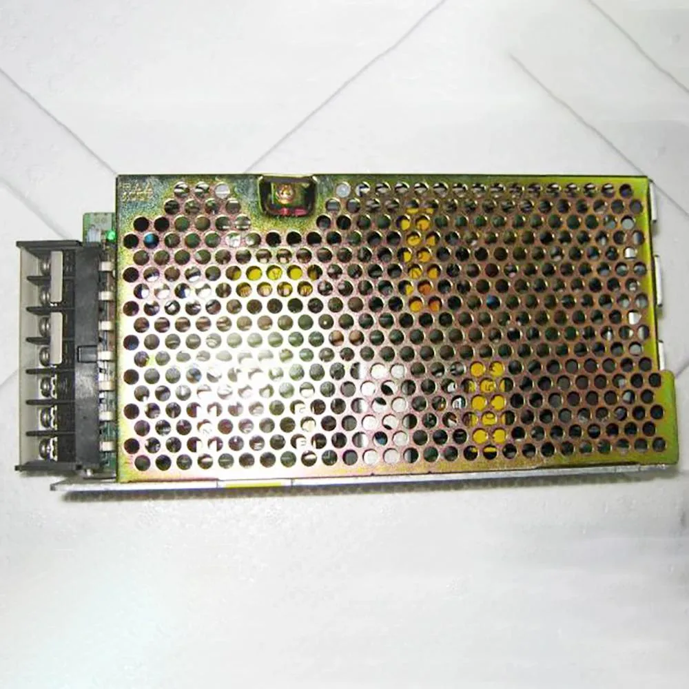 Rectangular metal ATX power supply unit with ventilation grille and label showing 24V 4.5A 100W
