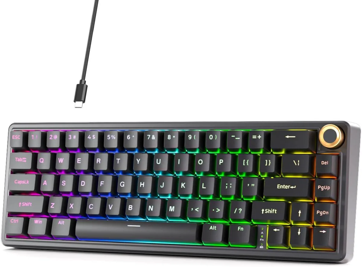 Compact 60 percent mechanical keyboard in black with a volume knob and RGB backlighting