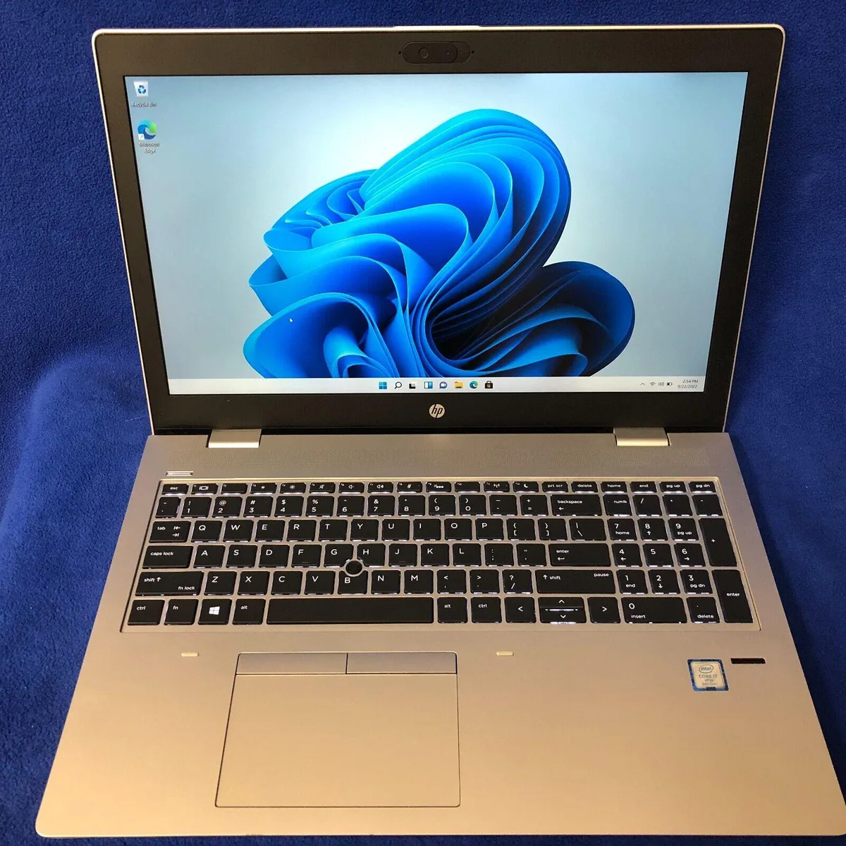Silver HP ProBook 650 G4 15.6 inch laptop closed on table