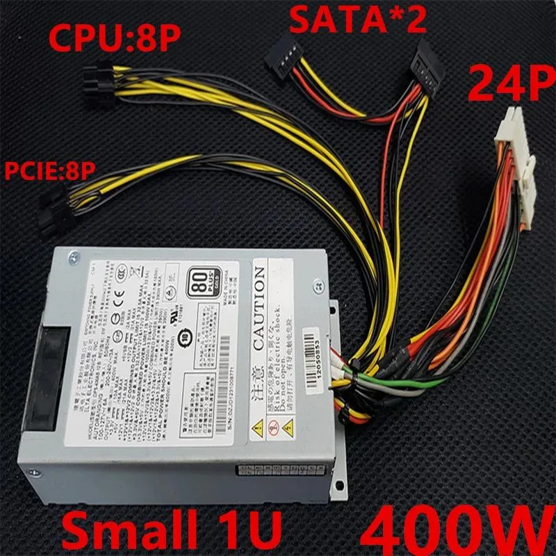 Compact silver Flex ATX power supply unit with fan grille and cable bundle