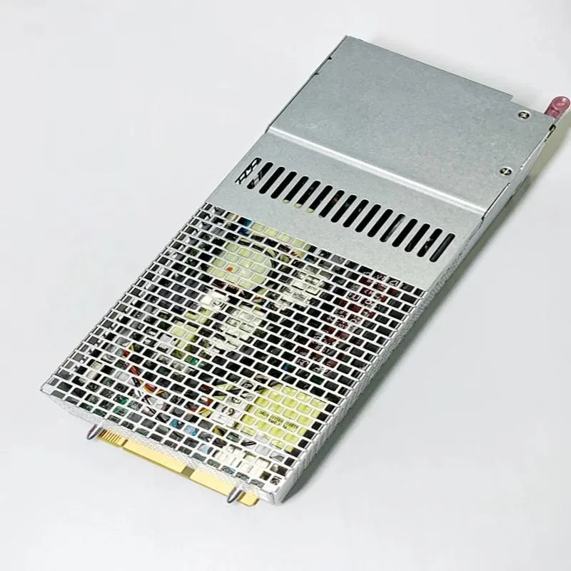 Silver rectangular ATX power supply unit with cooling fan and cable connectors
