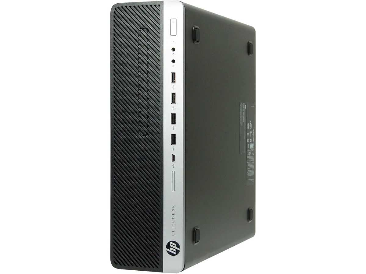 Compact silver small-form-factor desktop tower with front USB ports and optical drive slot