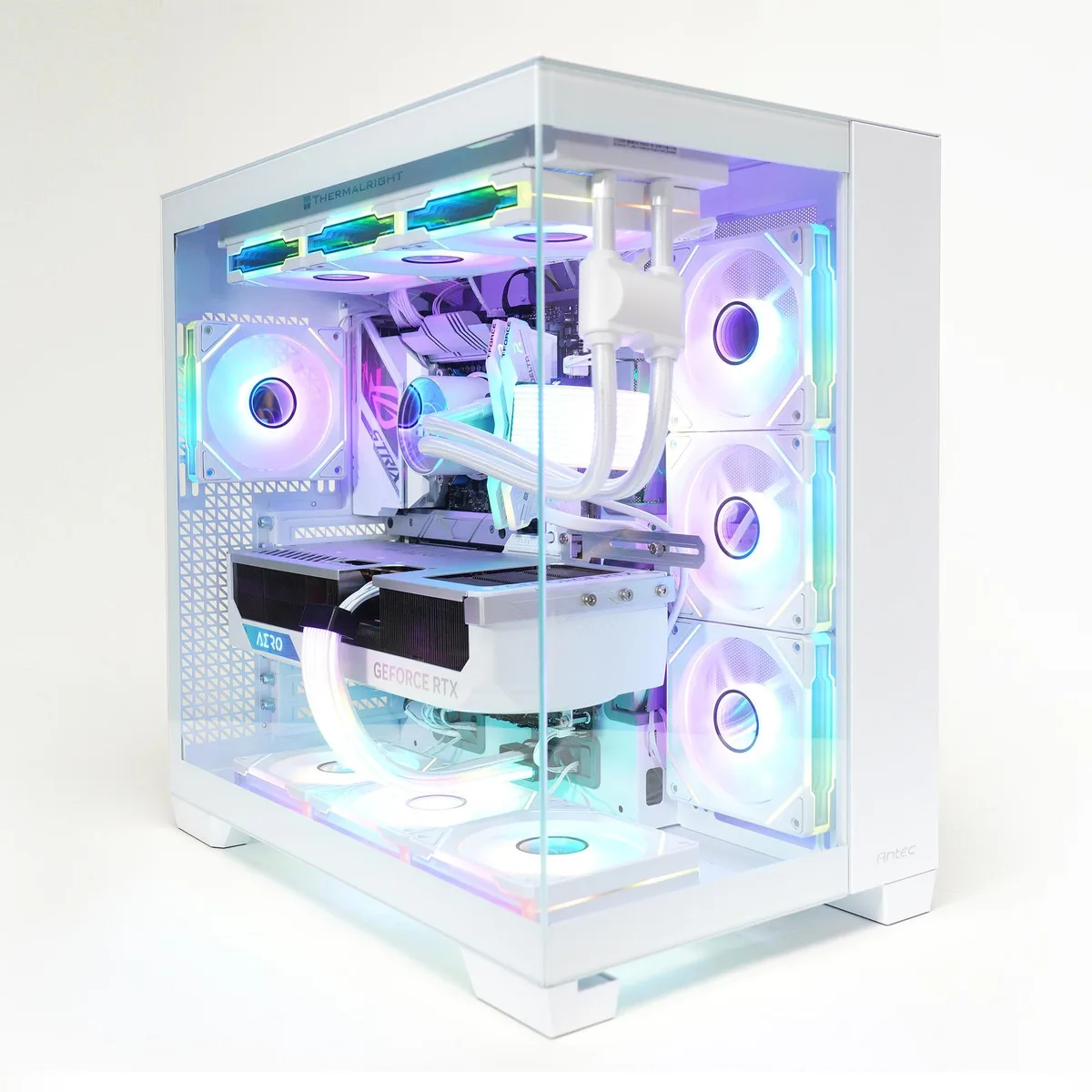 White gaming desktop tower with glass side panel and 10 white infinity mirror fans