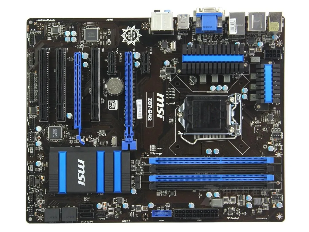 Green ATX motherboard with silver heatsinks, black slots and rear I/O panel