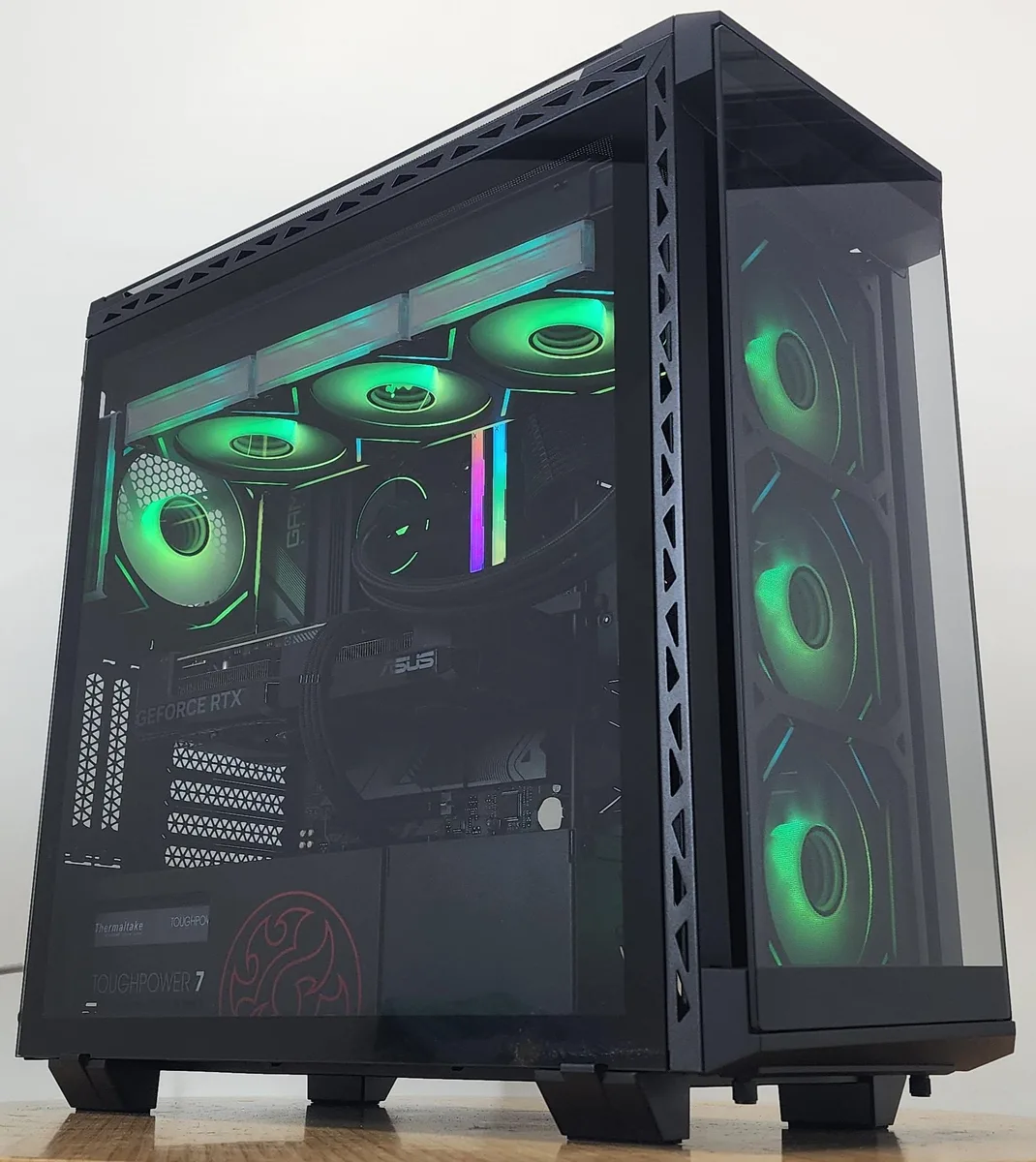 White mid-tower case with 360mm RGB AIO cooler and RTX 4070 graphics card