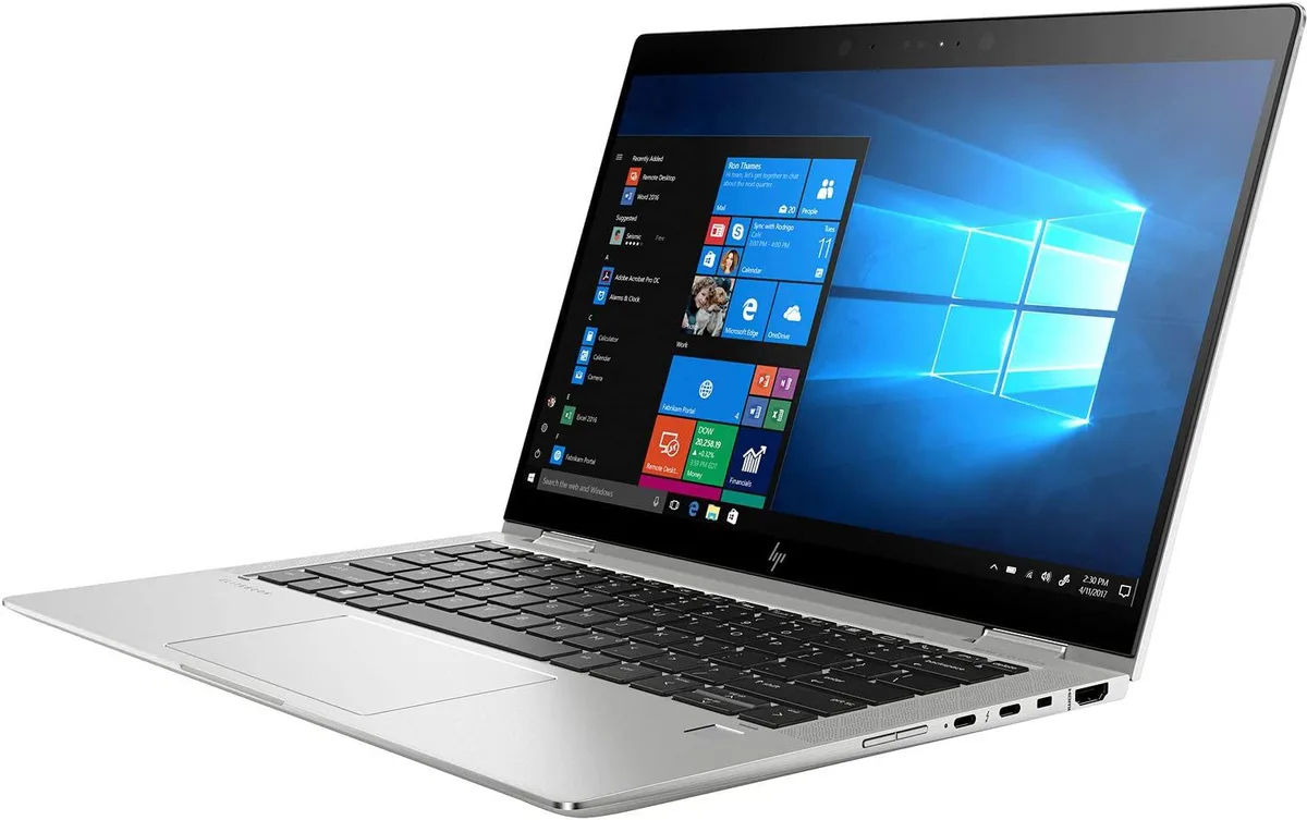 Silver 13.3 inch convertible laptop with touchscreen and 360 degree hinge