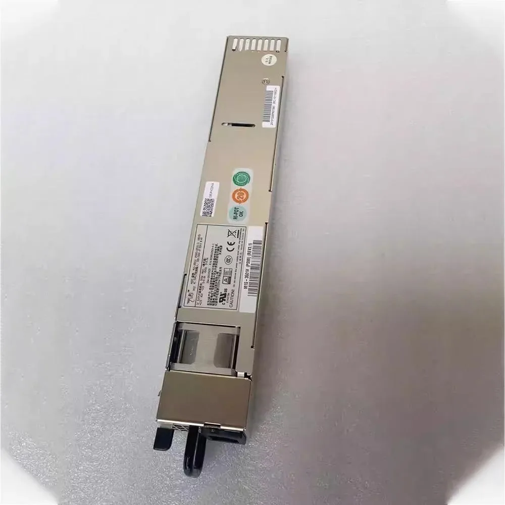 Silver rectangular server power supply unit with rear fan grille and power connector