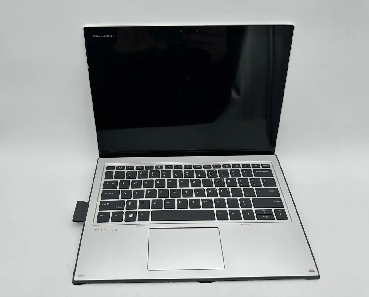 Silver detachable tablet with keyboard cover attached