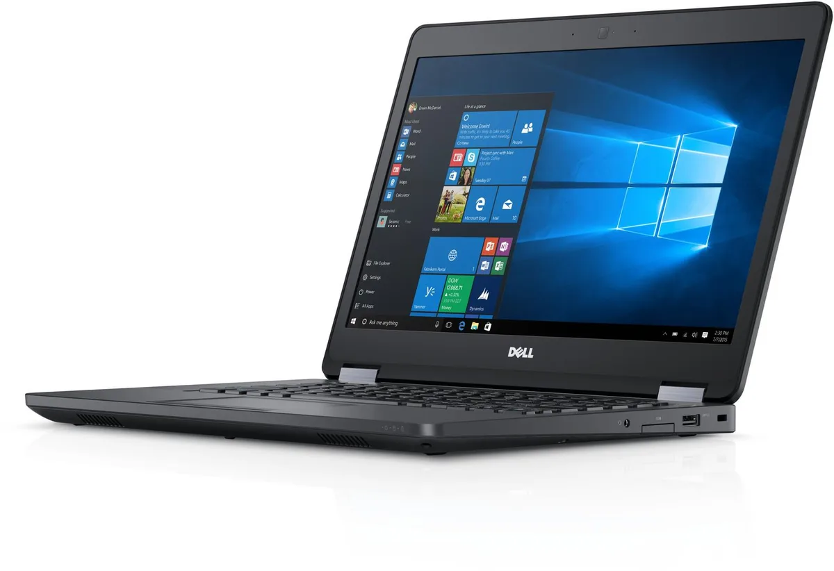 Silver 14-inch Dell Latitude E5470 laptop closed on a flat surface
