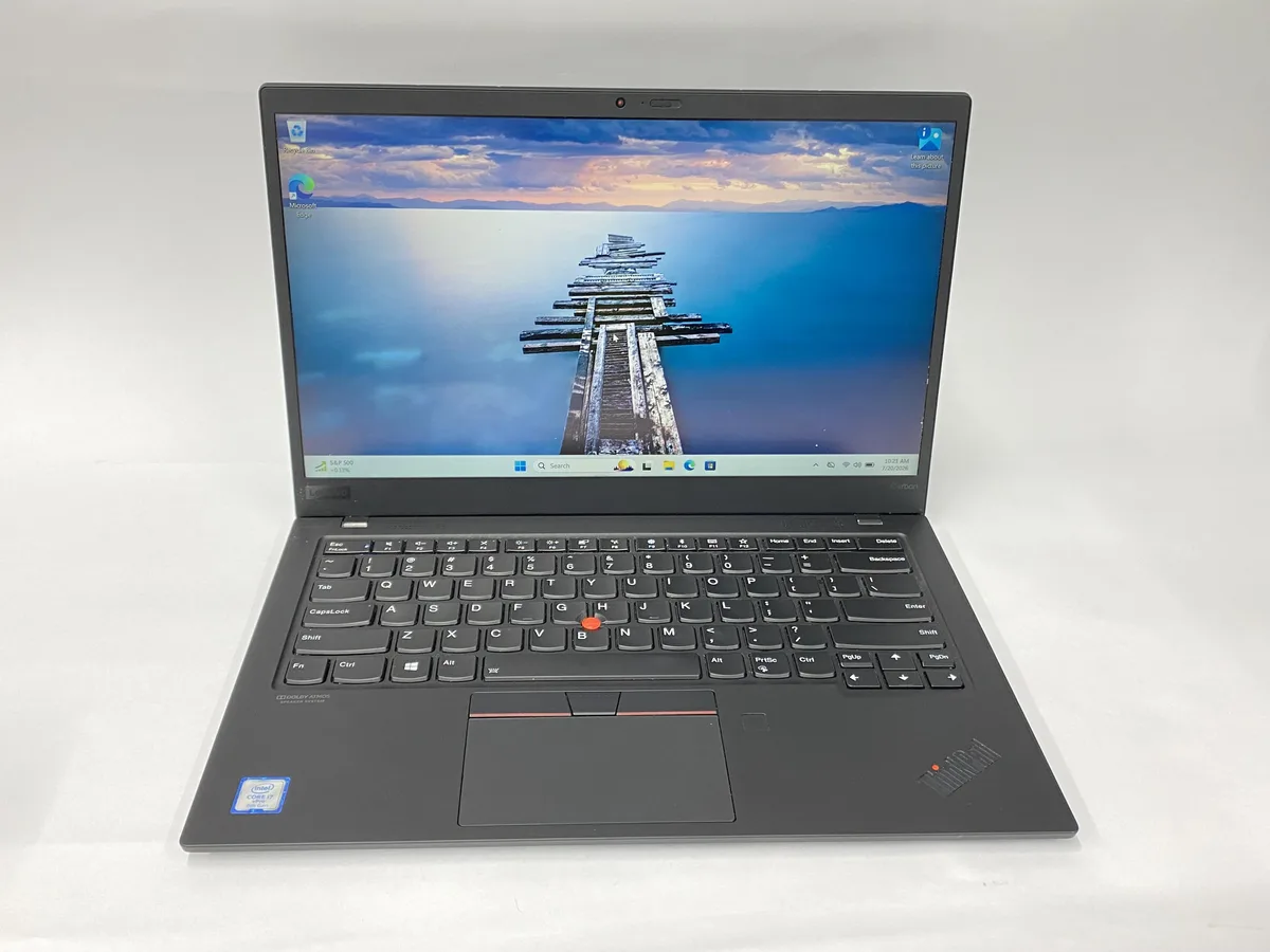 Silver Dell Precision 3551 laptop, 15 inch screen, visible scratches and scuffs on lid