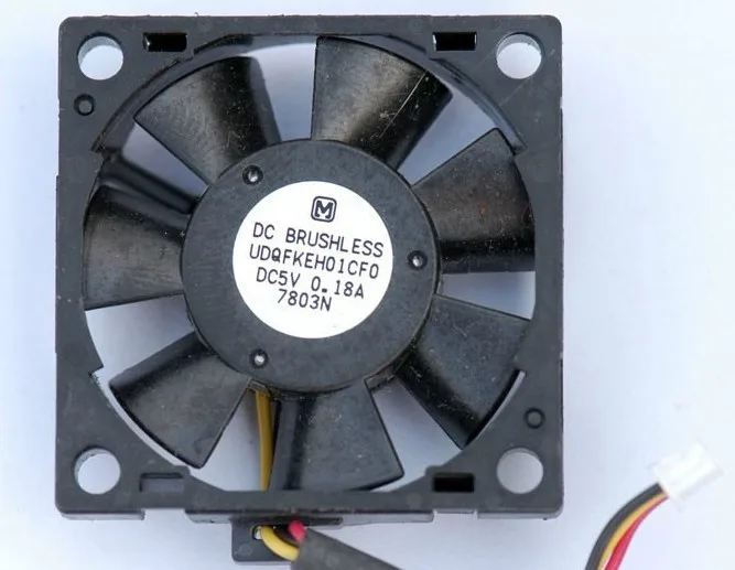 Small black square CPU fan with three-pin connector