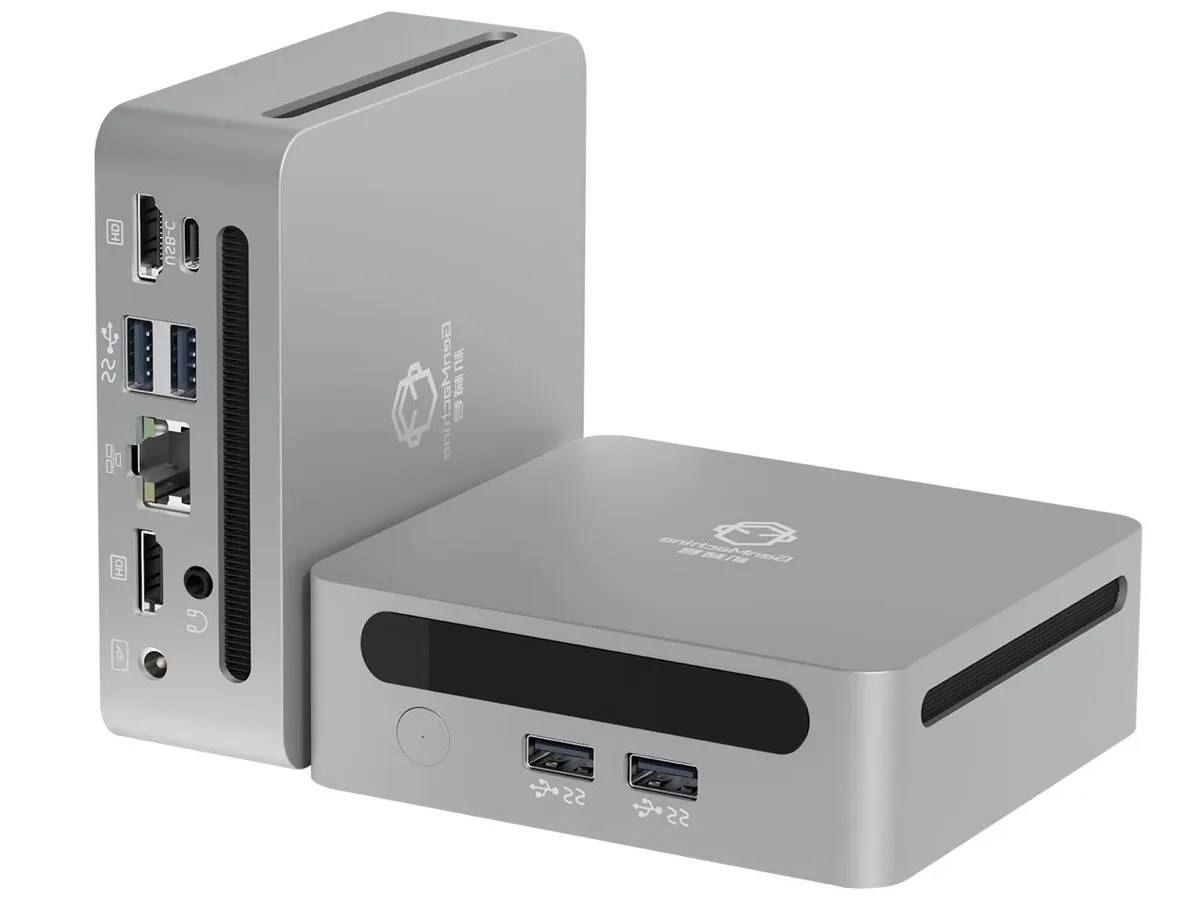 Small square mini PC with matte black finish and front USB-C port