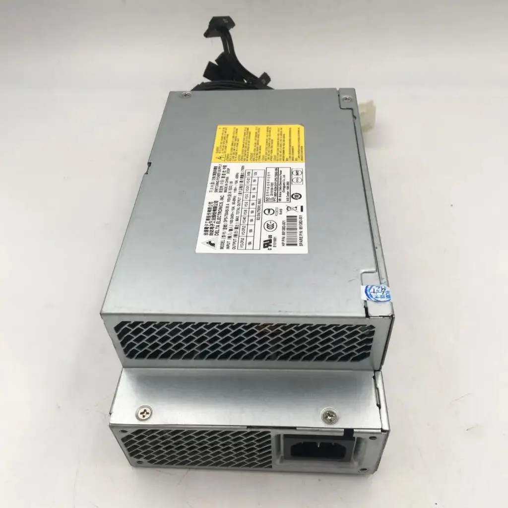 Rectangular silver ATX power supply unit with fan grille and power socket